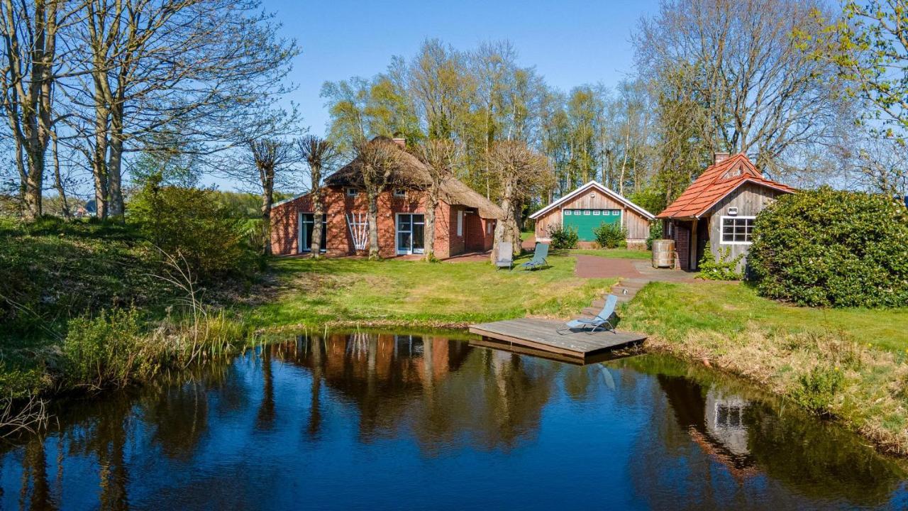Reetdach Ostfriesenhaus Villa Sudbrookmerland Bagian luar foto