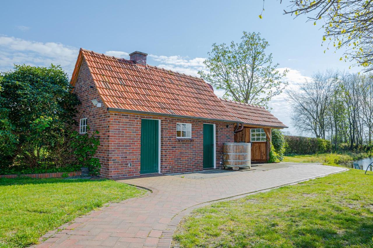 Reetdach Ostfriesenhaus Villa Sudbrookmerland Bagian luar foto