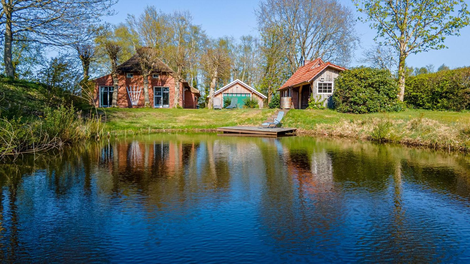 Reetdach Ostfriesenhaus Villa Sudbrookmerland Bagian luar foto